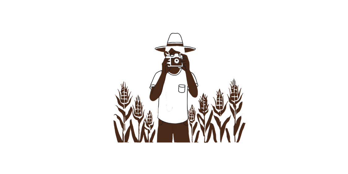 Illustration of a boy with a camera in a field